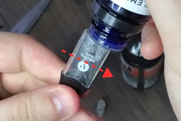 Drop E-Liquid Into The Pod Until Halfway In